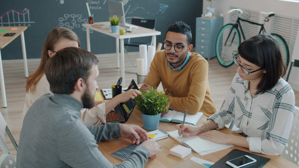 Colleagues working together at a table
